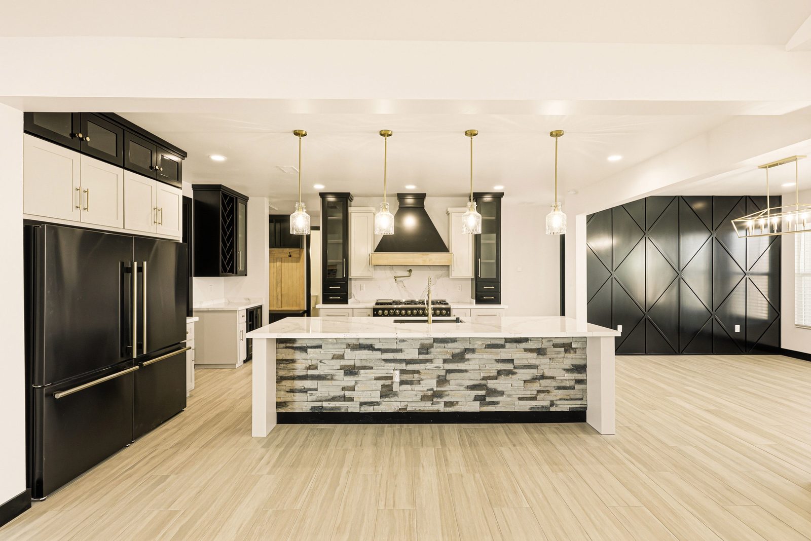 Custom kitchen with black cabinetry built by Solano Builders in Rio Rancho, New Mexico