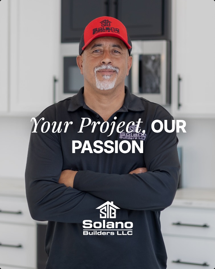 Solano Builders family and team member in a completed custom kitchen