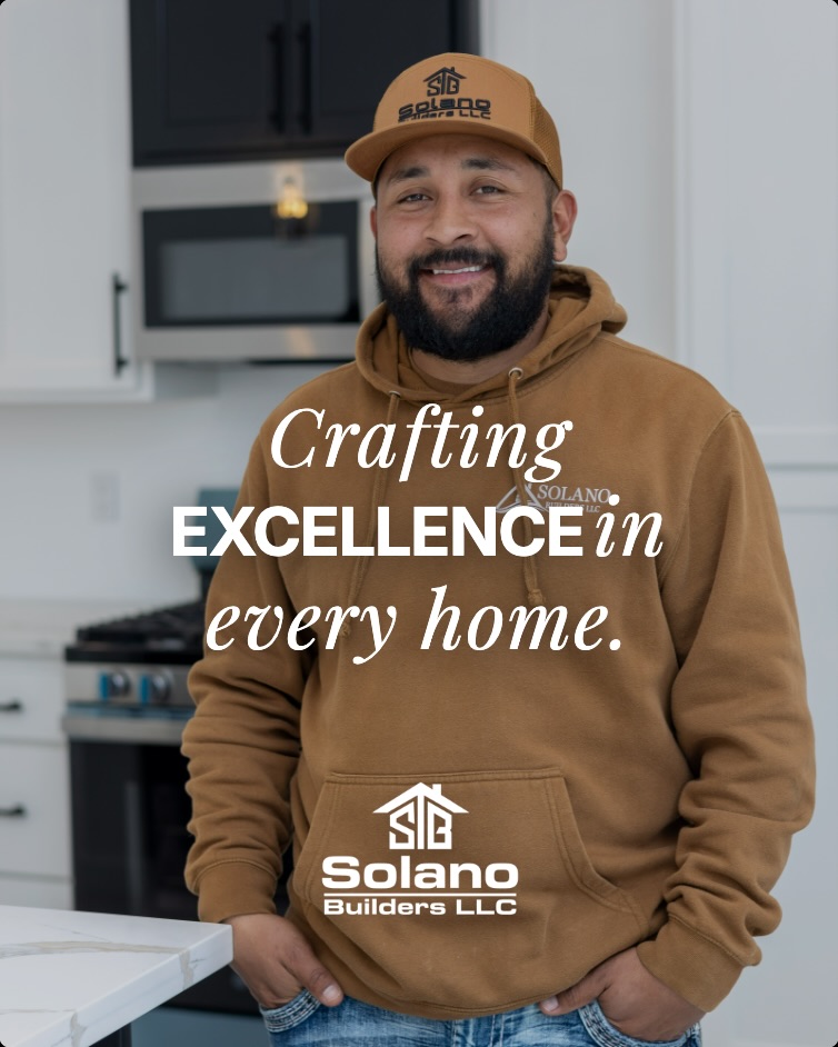 Solano Builders craftsman standing in a completed custom kitchen